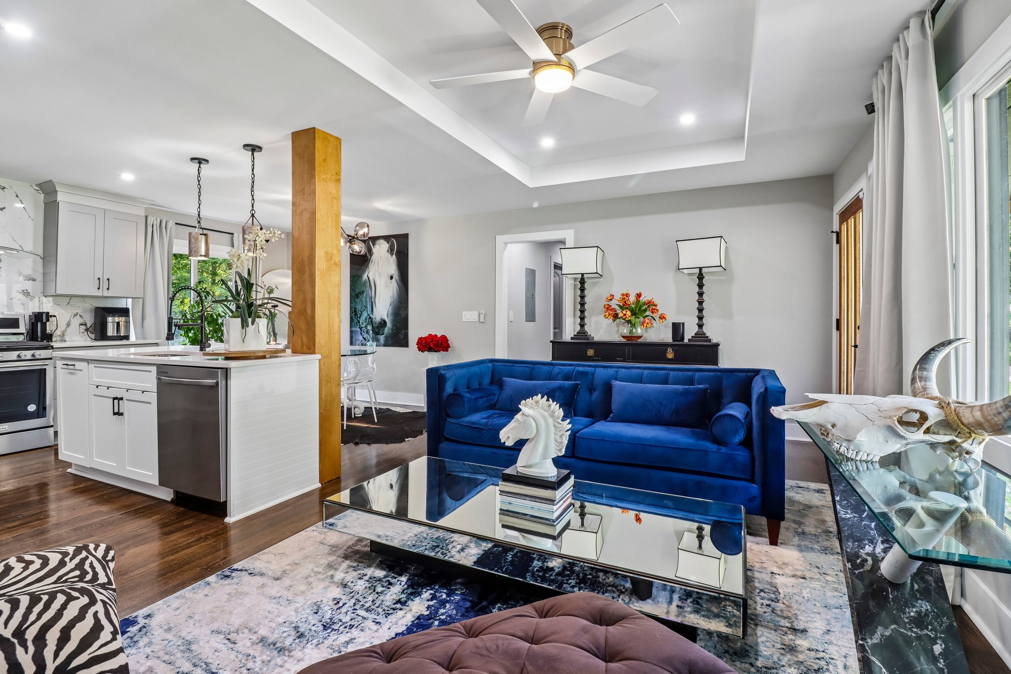 Open-concept living flows naturally into the custom kitchen
