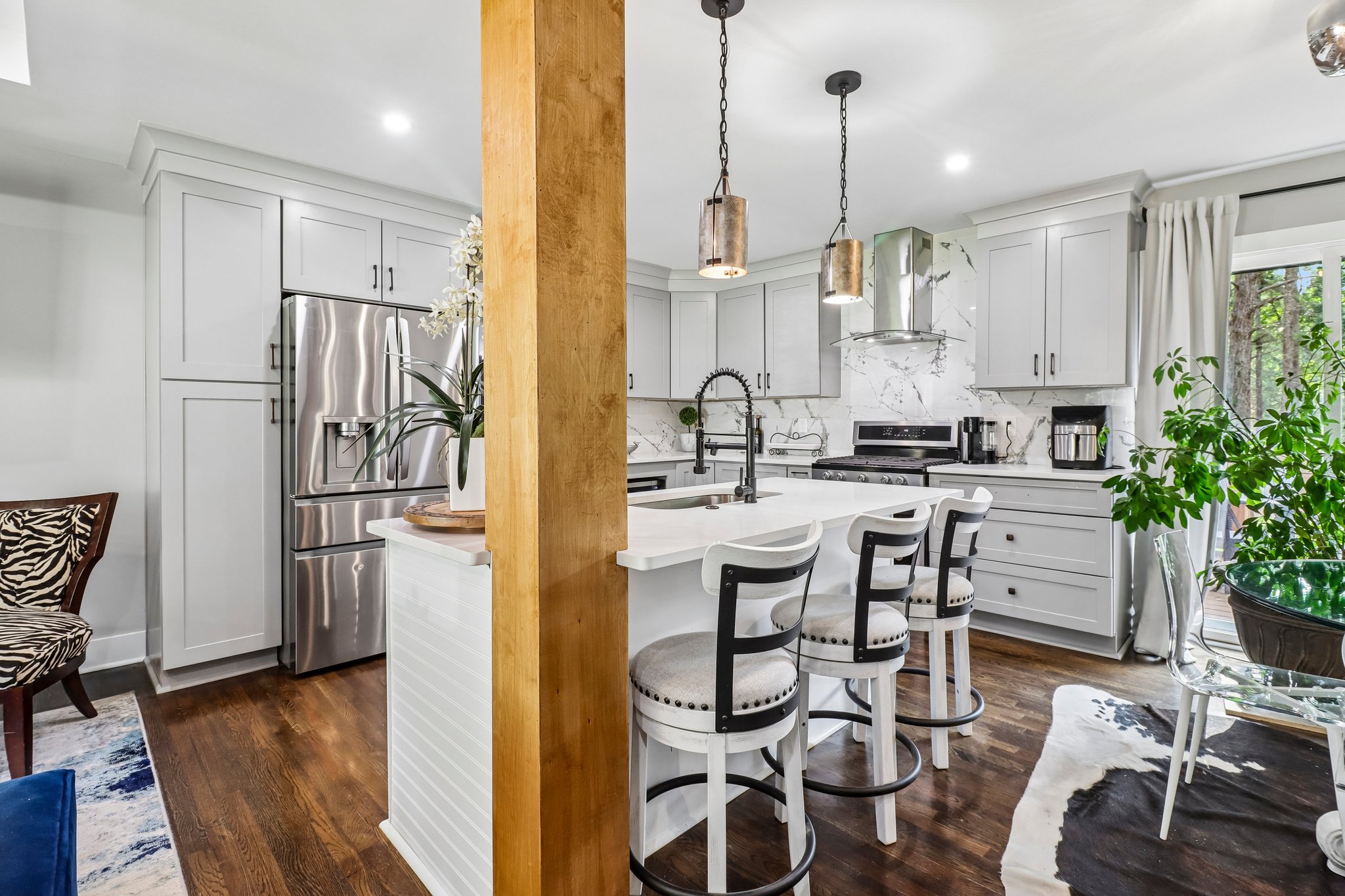 Oversized island invites conversation, cocktails and casual meals