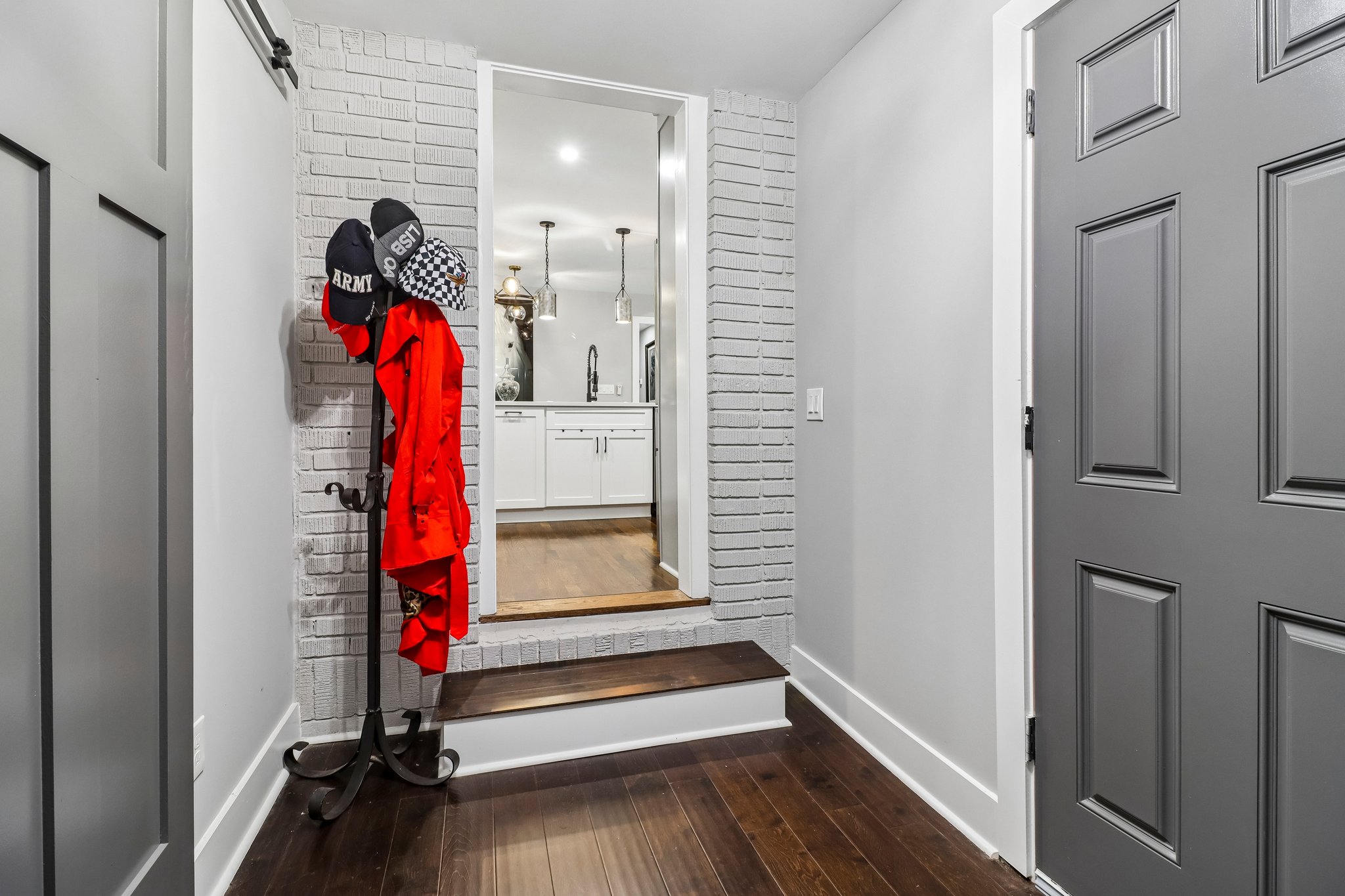 Secondary entry adds everyday convenience beside the kitchen