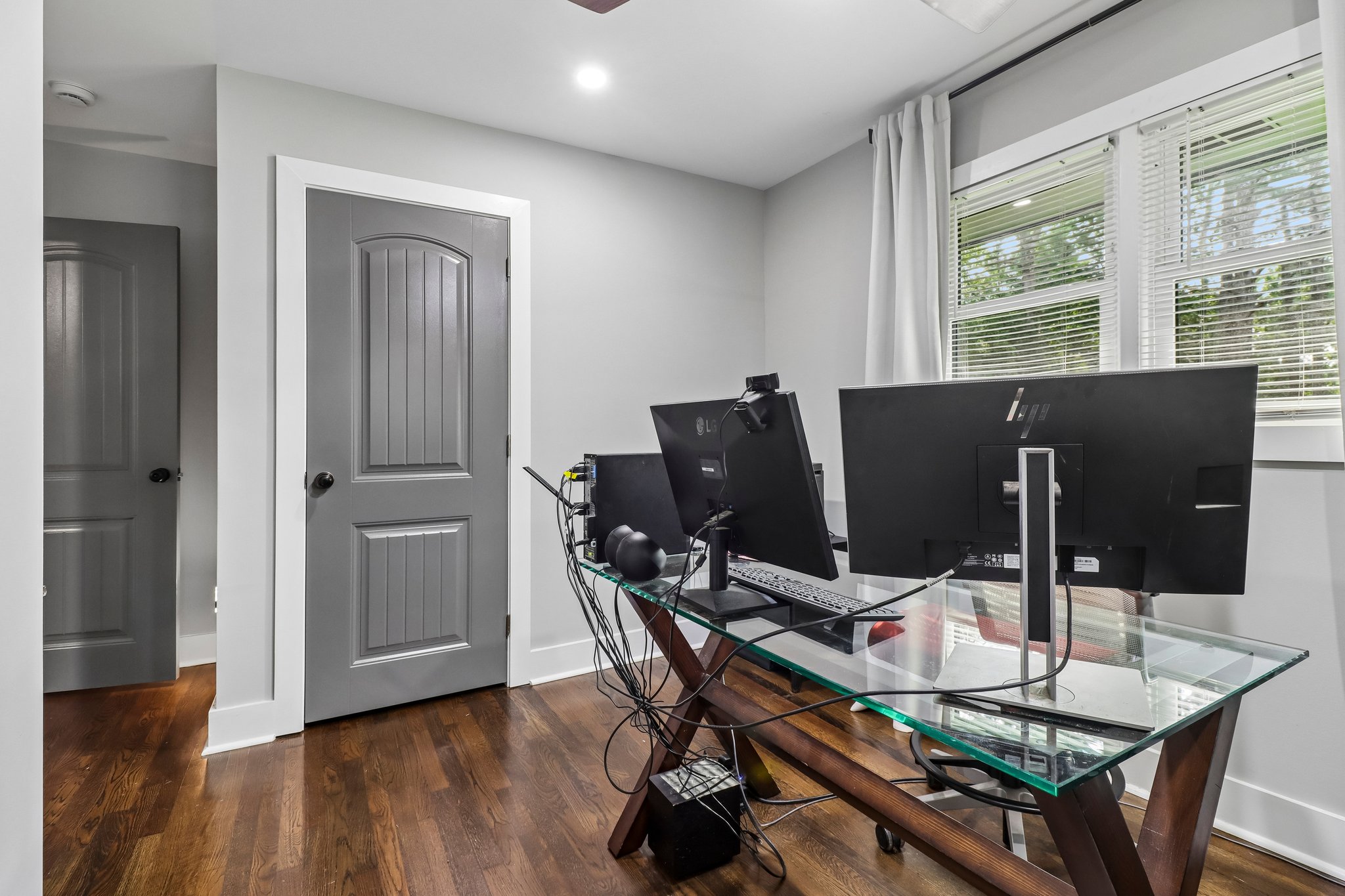 Hardwood floors, natural light and a closet complete the third bedroom