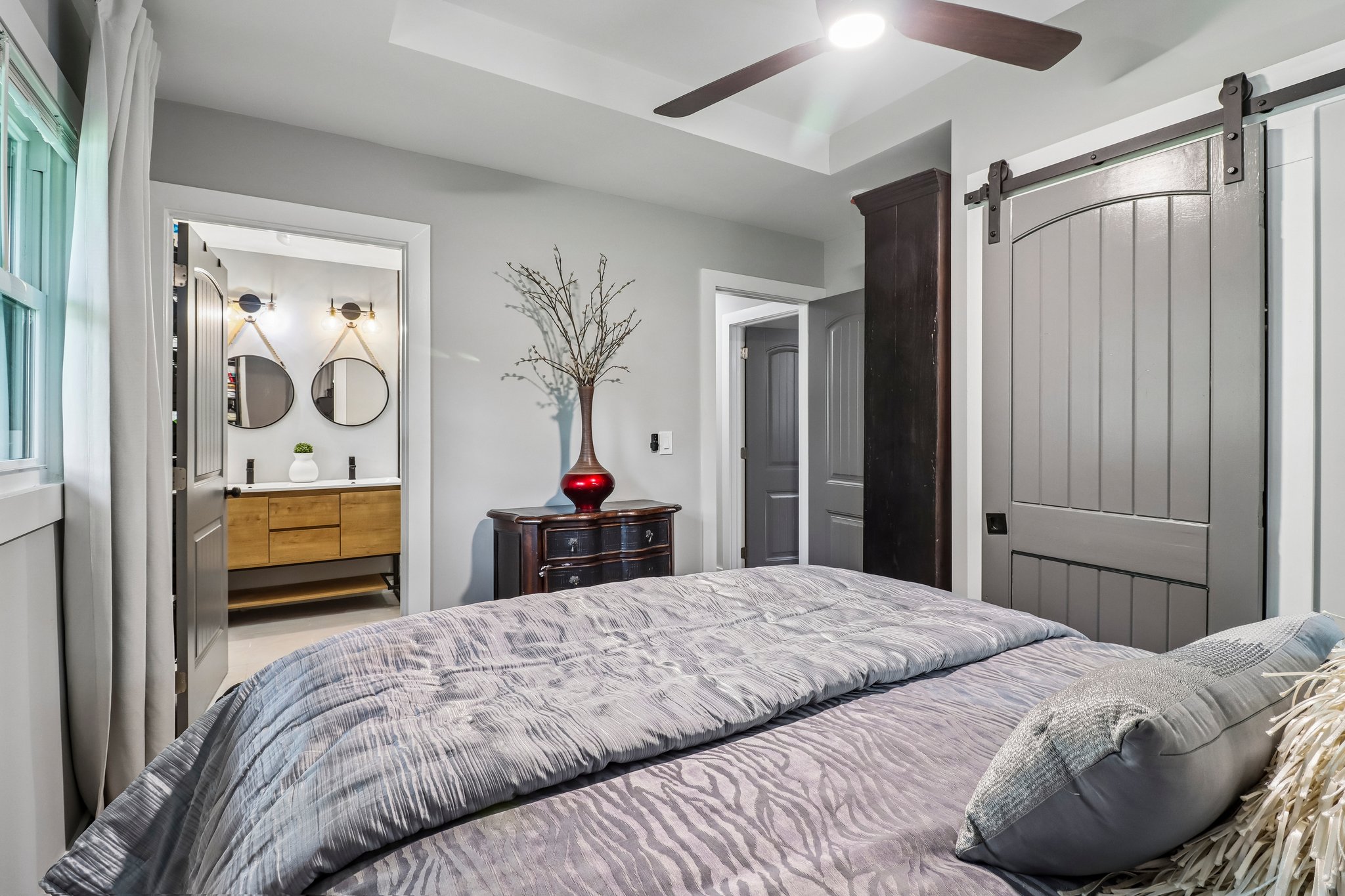 Private suite layout connects bedroom, custom closet and bath
