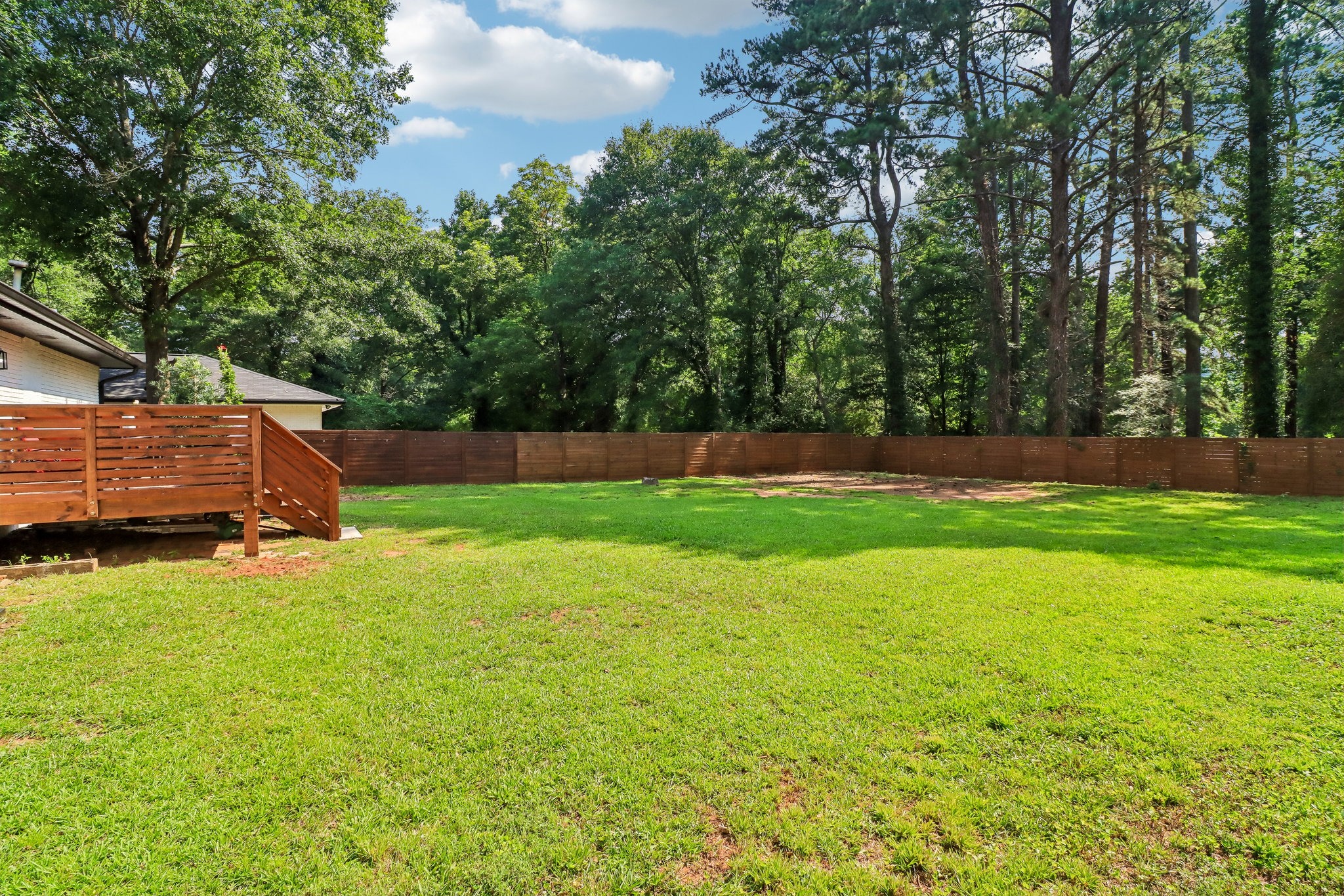 Open lawn is ready for pets, play, gardens or future entertaining